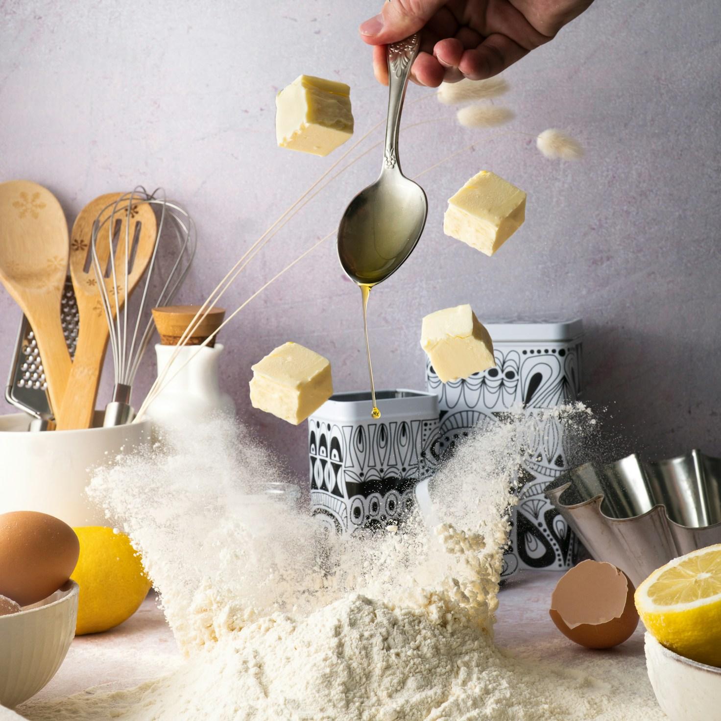 Diverse group of community members sharing a meal together, showcasing the social bonds formed through collaborative cooking